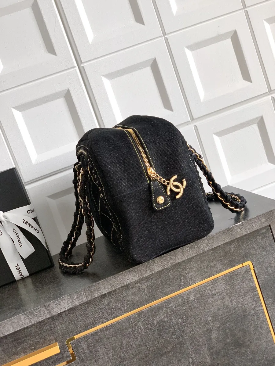 chanel_denim_bostonbag_2240000601656_side.jpg